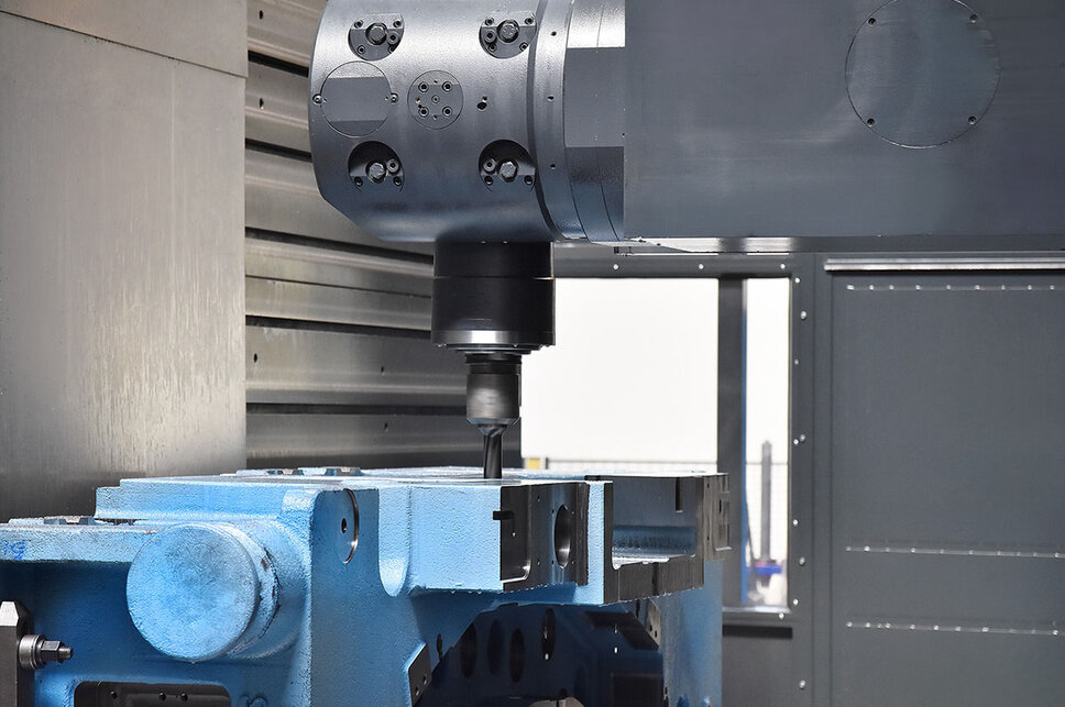  The milling head during the machining of a casting for a pressing tool illustrates the precision and expertise in CNC machining.